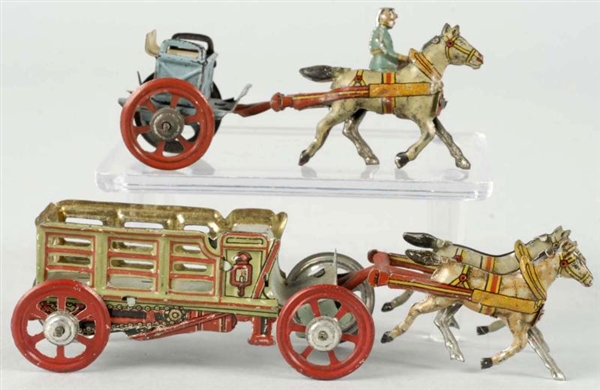 LOT OF 2: HORSE-DRAWN PENNY TOYS.                 