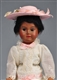 BROWN FRENCH BISQUE CHILD DOLL.                   