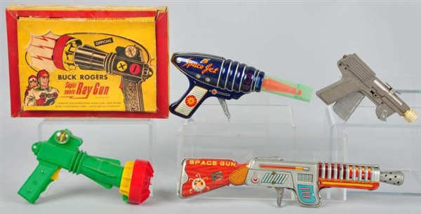 LOT OF 4: TOY SPACE GUNS.                         