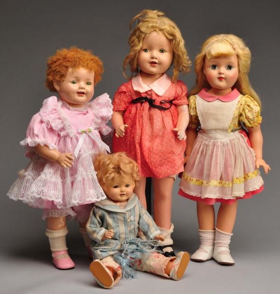 LOT OF 4: COLLECTIBLE DOLLS.                      
