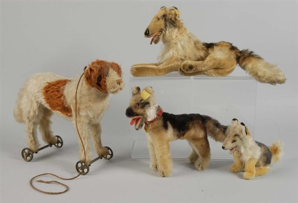 LOT OF 4: EARLY STEIFF DOGS.                      