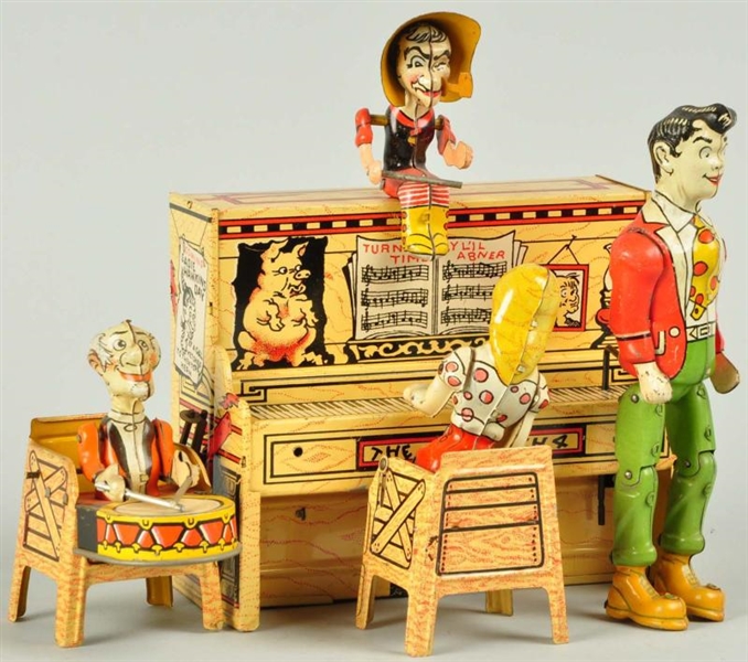 TIN UNIQUE ART LIL ABNER DOG PATCH BAND TOY.     