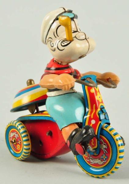 TIN LITHO LINEMAR POPEYE ON TRICYCLE WIND-UP TOY. 