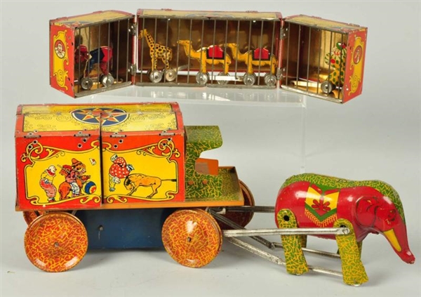 TIN LITHO LINDSTROM CIRCUS WAGON WIND-UP TOY.     