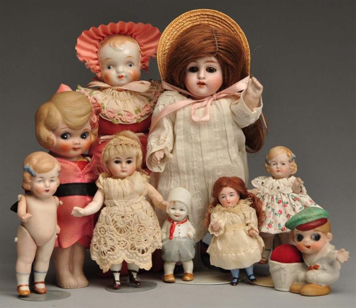 LOT OF 10: BISQUE AND CHINA DOLLS.                