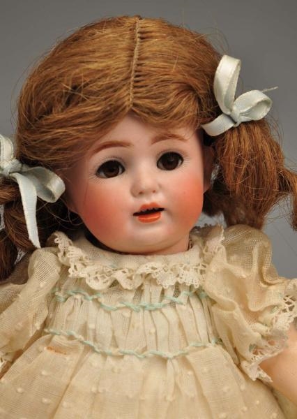GERMAN BISQUE CHARACTER CHILD DOLL.               