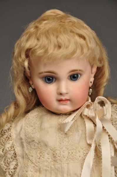 FRENCH BISQUE BÉBÉ DOLL.                          