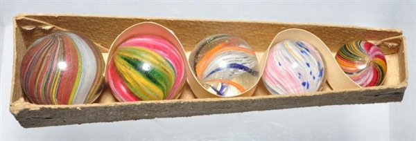 MARBLE COFFIN BOX WITH 5 HANDMADE MARBLES.        