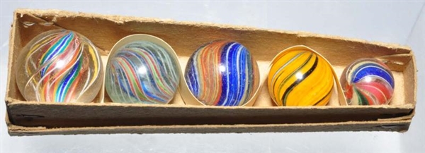 MARBLE COFFIN BOX WITH 5 HANDMADE MARBLES.        