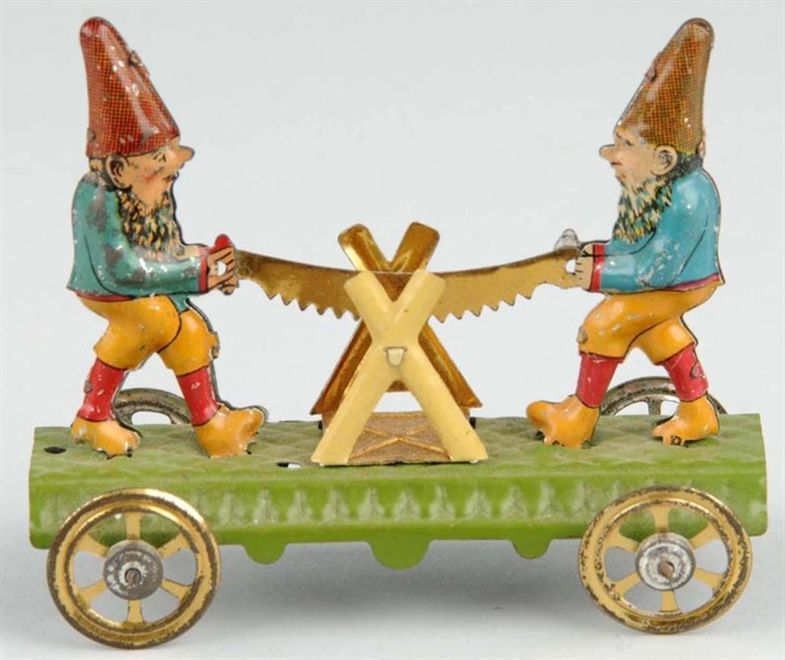 TIN LITHO GNOMES SAWING PIECE OF WOOD PENNY TOY.  