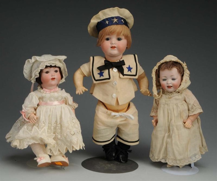 LOT OF 3: GERMAN BISQUE CHARACTER DOLLS.          