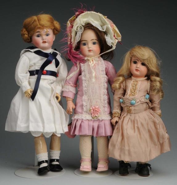 LOT OF 3: FRENCH BISQUE DOLLS.                    