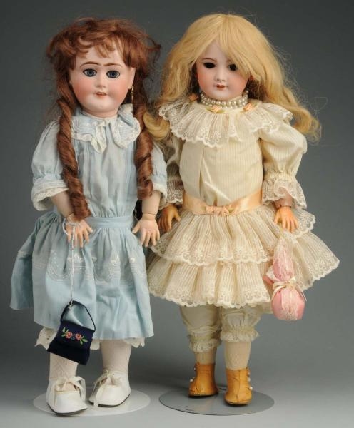 LOT OF 2: FRENCH DOLLS.                           