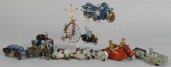 LOT OF 11: ASSORTED MOTORCYCLE TOYS.              