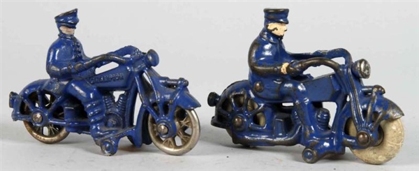 LOT OF 2: CAST IRON POLICE MOTORCYCLE TOYS.       