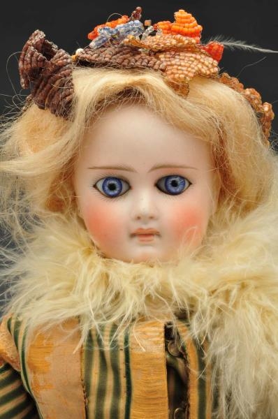 EARLY BISQUE CLOSED MOUTH LADY DOLL.              