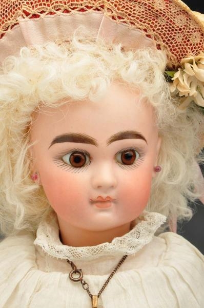 BISQUE CLOSED MOUTH CHILD DOLL.                   