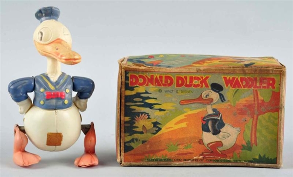 CELLULOID DISNEY DONALD DUCK WADDLER WIND-UP TOY. 