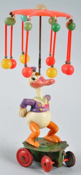 CELLULOID DISNEY DONALD DUCK CAROUSEL WIND-UP TOY 