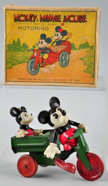 CELLULOID MICKEY & MINNIE MOUSE MOTORING TOY.     