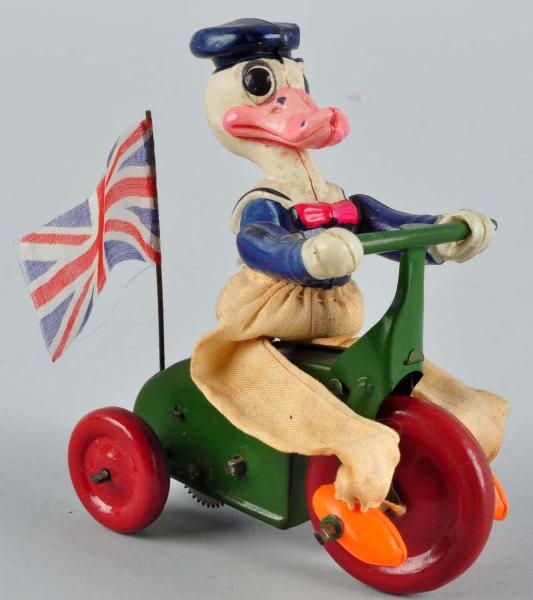 CELLULOID DISNEY DONALD DUCK TRICYCLE WIND-UP TOY 