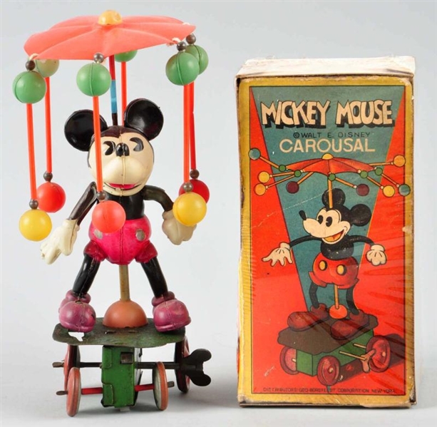 CELLULOID DISNEY MICKEY CAROUSEL WIND-UP TOY.     