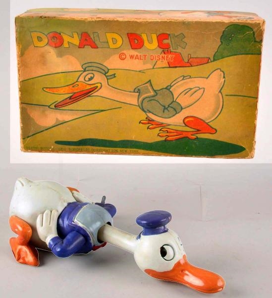 CELLULOID DISNEY CRAWLING DONALD DUCK WIND-UP TOY 