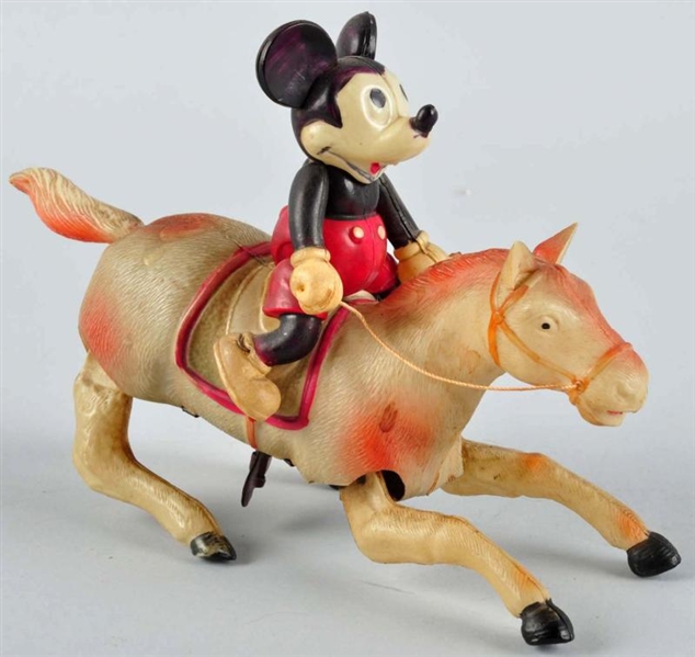 CELLULOID DISNEY MICKEY RIDING HORSE WIND-UP TOY. 