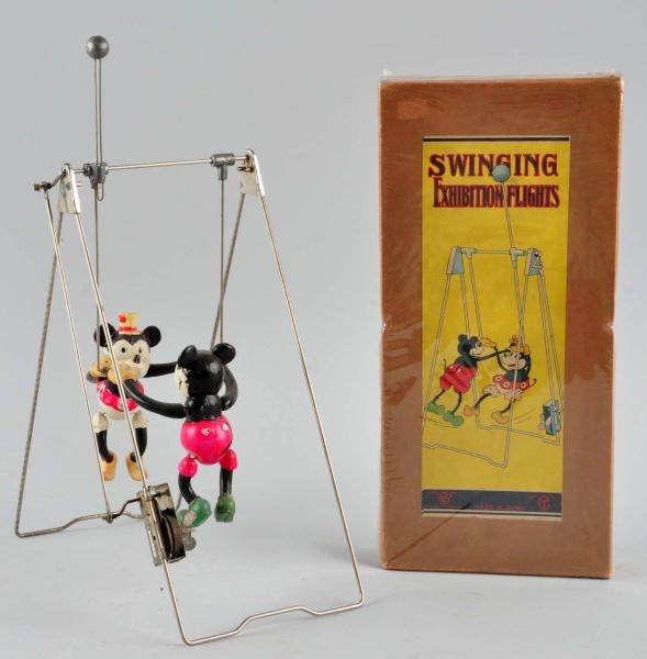 CELLULOID MICKEY & MINNIE ACROBATS WIND-UP TOY.   