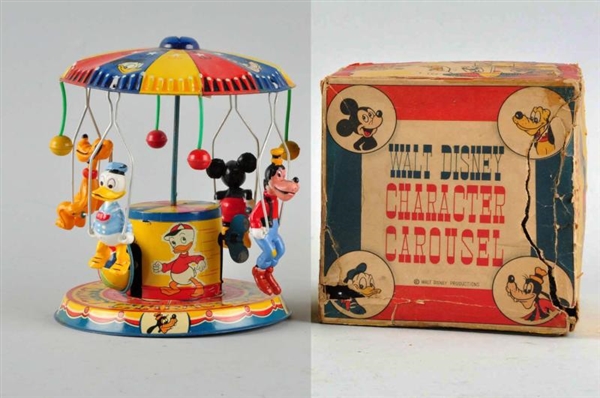 TIN LITHO LINEMAR CHARACTER CAROUSEL WIND-UP TOY. 