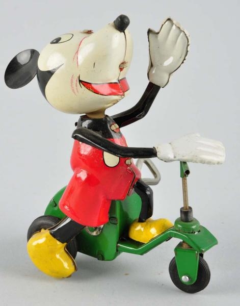 TIN LITHO LINEMAR DISNEY SCOOTER WIND-UP TOY.     