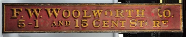 WOODEN F.W. WOOLWORTH SIGN.                       