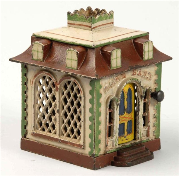 CAST IRON HOME MECHANICAL BANK WITH DORMERS.      