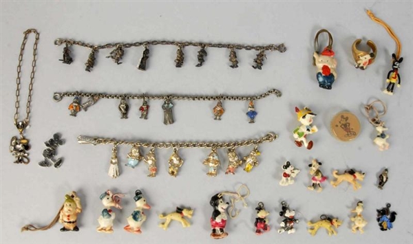 LOT OF CELLULOID DISNEY CHARACTER CHARMS.         