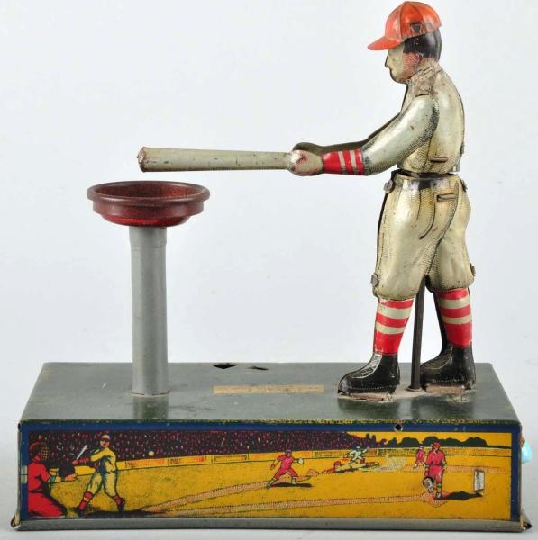 TIN LITHO HOME RUN BABE WIND-UP TOY.              
