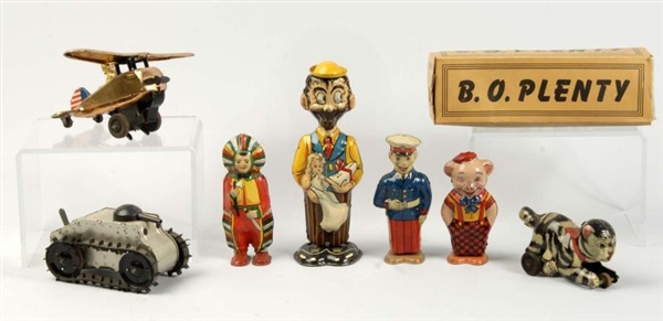 LOT OF 7: TIN LITHO CHARACTER WIND-UP TOYS.       