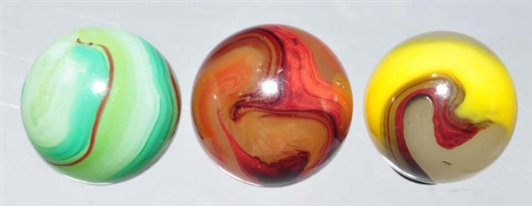LOT OF 3: AKRO AGATE OXBLOOD MARBLES.             