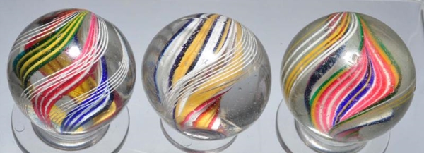 LOT OF 3: MULTI-COLORED SWIRL MARBLES.            