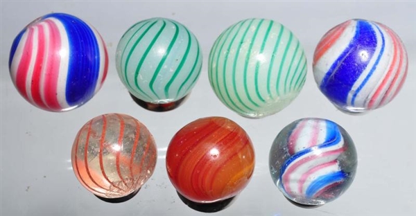 LOT OF 7: ASSORTED HANDMADE MARBLES.              
