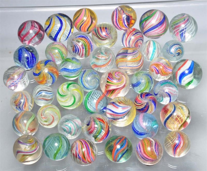 LOT OF 42: ASSORTED SWIRL MARBLES.                