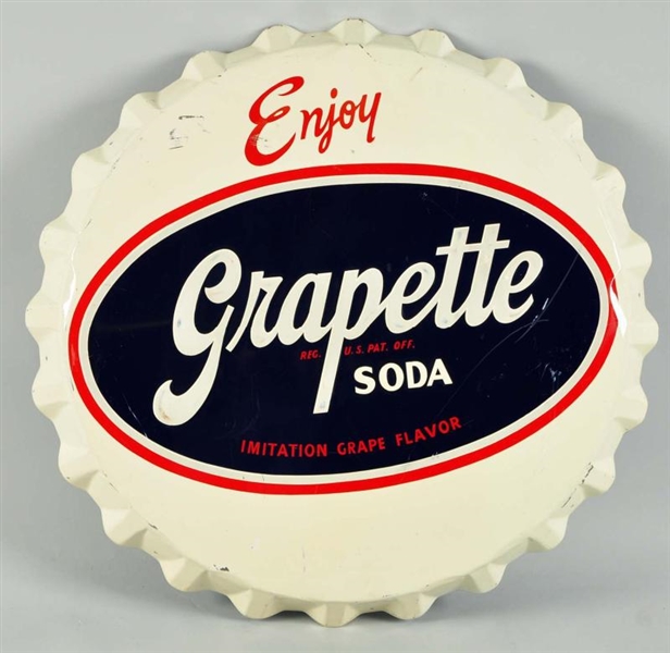 1950S EMBOSSED TIN GRAPETTE BOTTLE CAP SIGN.      