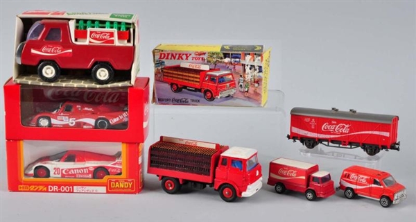 LOT OF ASSORTED COCA-COLA TRUCK AND CAR TOYS.     