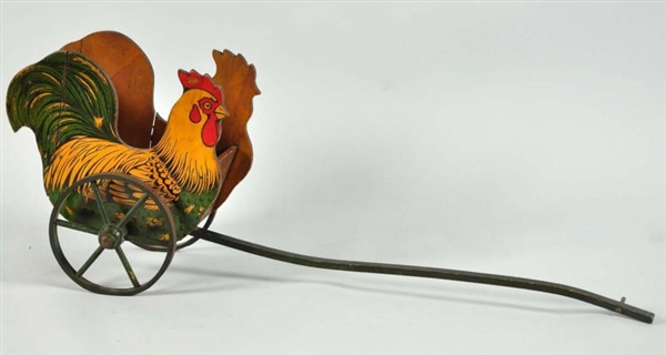EARLY WOODEN ROOSTER PULL TOY.                    