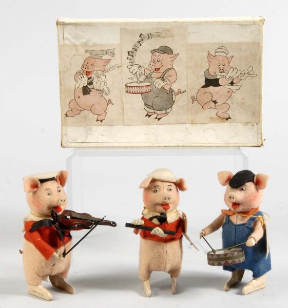 LOT OF 3: SCHUCO 3 LITTLE PIGS WIND-UP TOYS.      