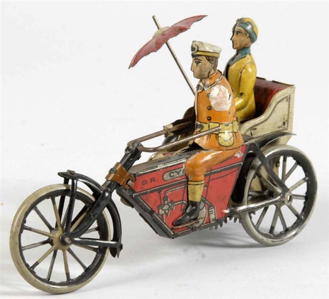 TIN LITHO MOTORCYCLE WITH SIDECAR WIND-UP TOY.    