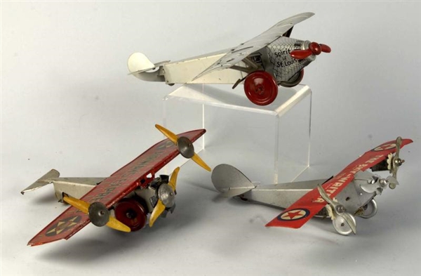 LOT OF 3: TIN LITHO AIRPLANE WIND-UP TOYS.        