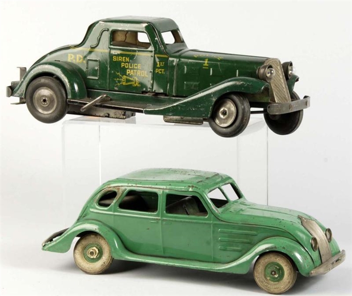 LOT OF 2: PRESSED STEEL AUTOMOBILE TOYS.          