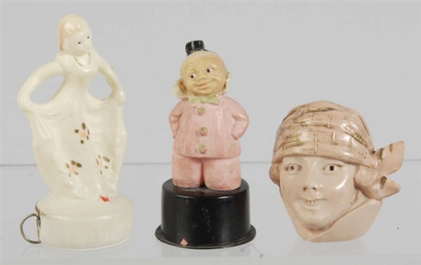 LOT OF 3: FIGURAL SEWING TAPE MEASURES.           