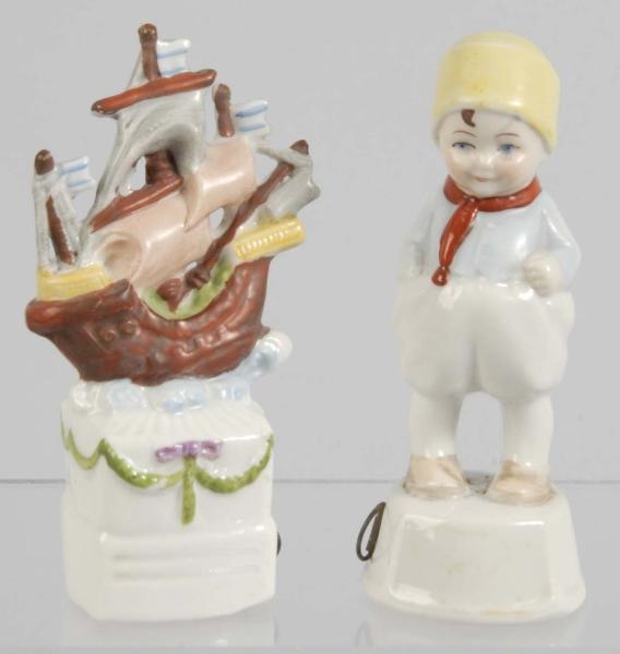 LOT OF 2: PORCELAIN FIGURAL SEWING TAPE MEASURES. 