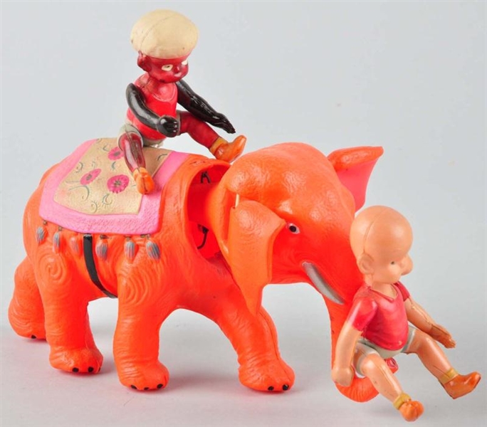 CELLULOID HENRY ON ELEPHANT WIND-UP TOY.          